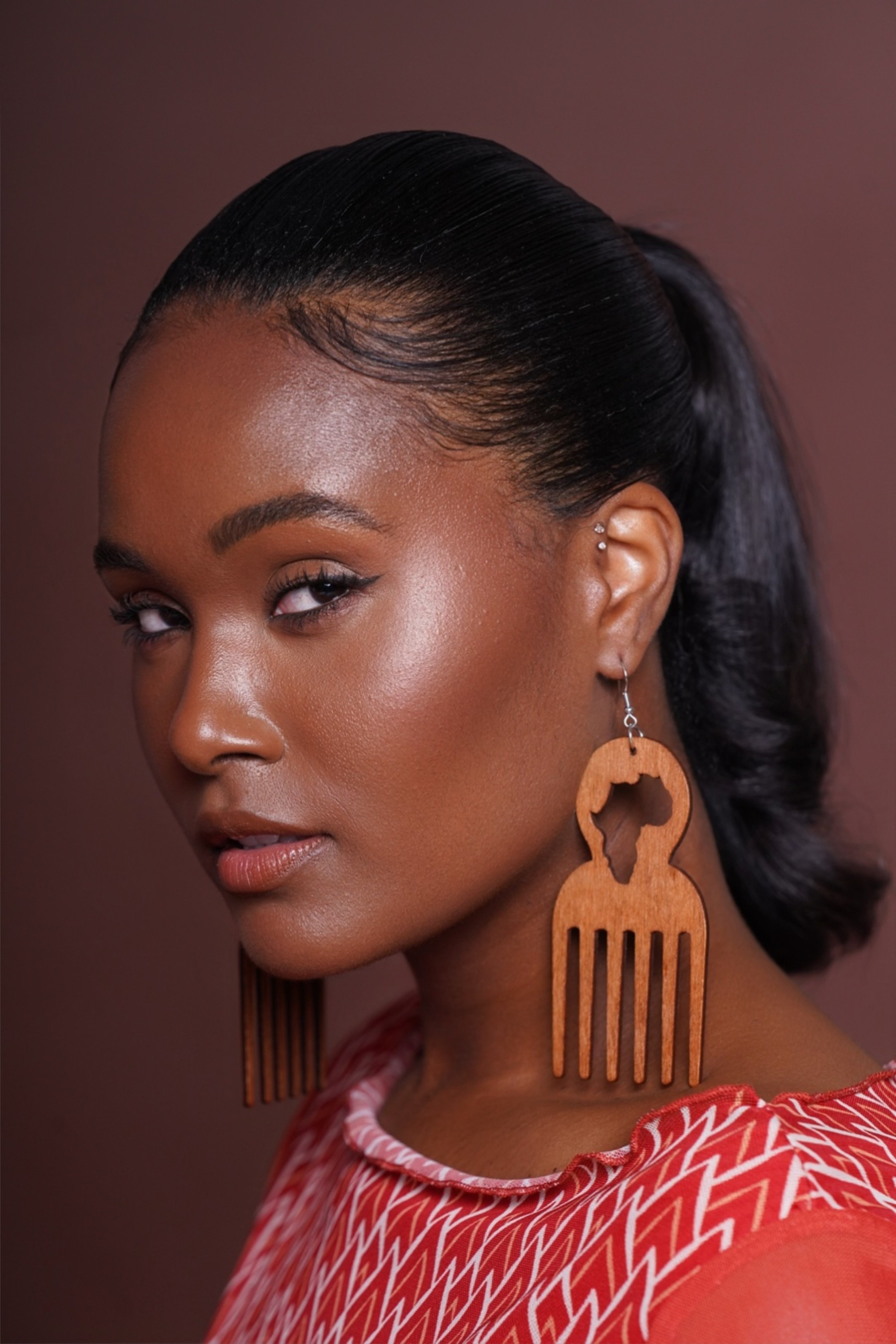 AFRICA COMB EARNINGS Lili Creation